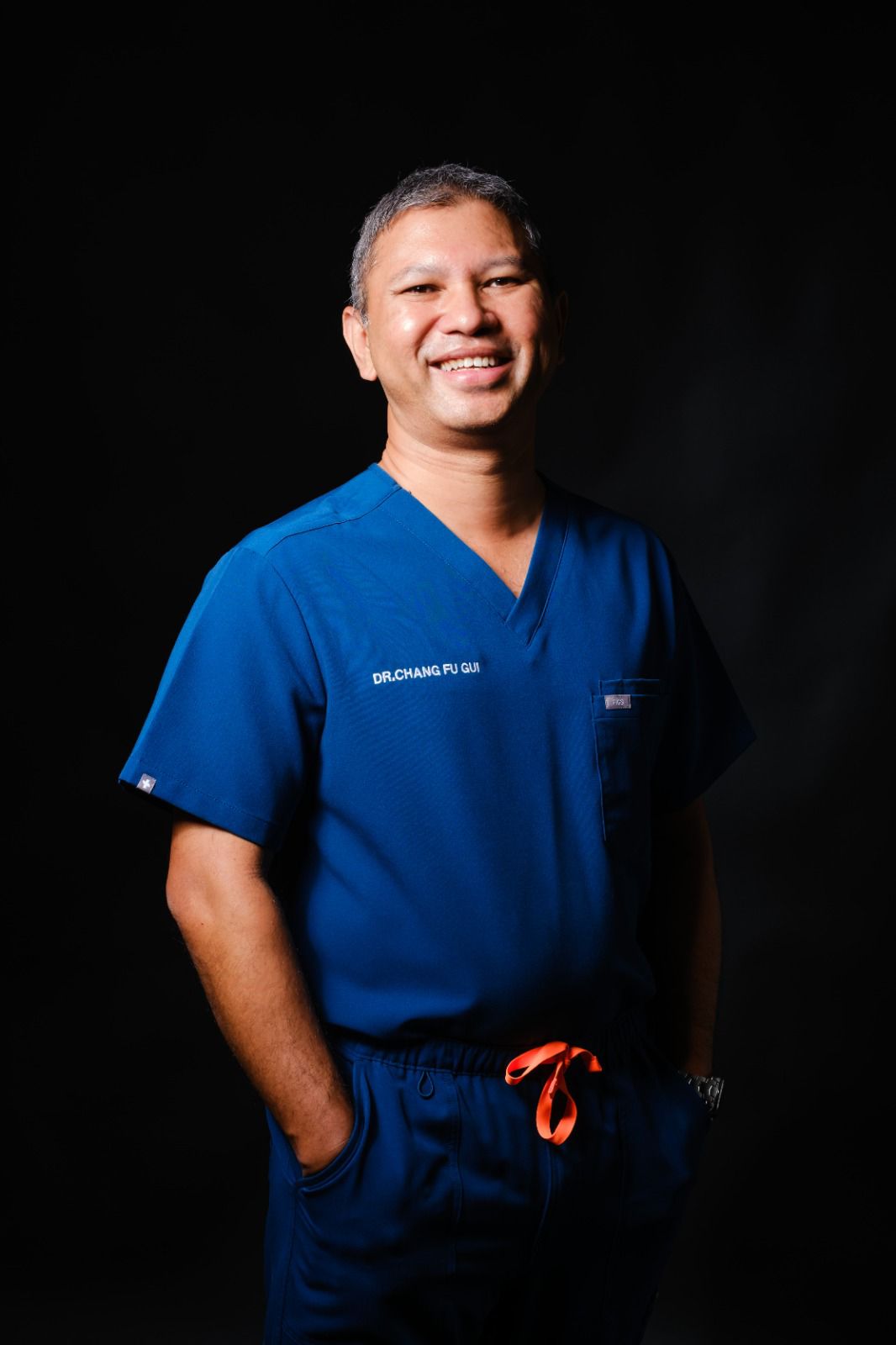 Dr Chang Fu-Gui in clinic attire